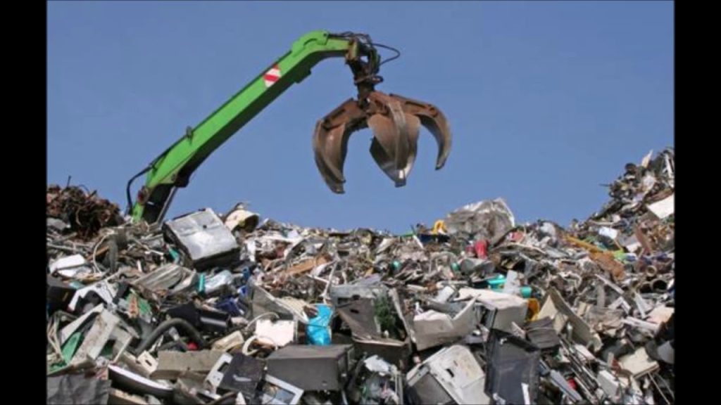 scrap metal recyclers in Wanganui collecting and sorting waste metal for recycling