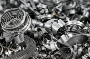 Scrap metal recycling yard with copper, aluminum, and steel ready to sell