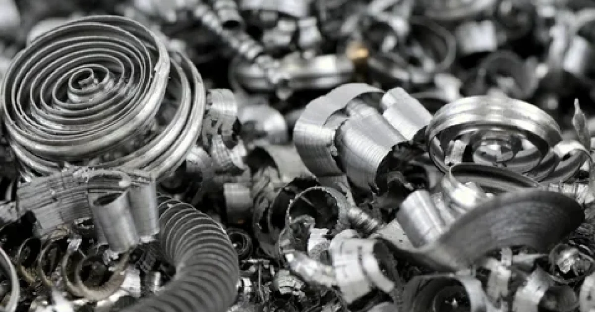 Scrap metal recycling yard with copper, aluminum, and steel ready to sell