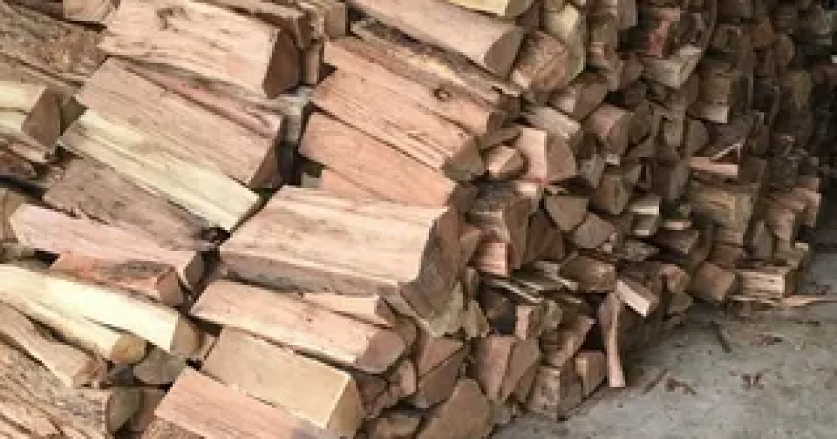 Cheap dry seasoned firewood stacked for delivery in Wanganui, ready for wood burners and home heating